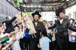 חגיגת הכנסת ספר תורה  להיכל ישיבת עסק התורה  ע"י הרבני הנגיד הרה"ח רבי יואל פליישמאן שליט"א פטרון הישיבה ונדבן הספר  בהשתתפות אדמור"י ורבני העיר שליט"א, מרביצי תורה ותלמידי הישיבה