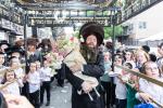 חגיגת הכנסת ספר תורה  להיכל ישיבת עסק התורה  ע"י הרבני הנגיד הרה"ח רבי יואל פליישמאן שליט"א פטרון הישיבה ונדבן הספר  בהשתתפות אדמור"י ורבני העיר שליט"א, מרביצי תורה ותלמידי הישיבה
