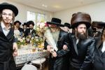 חגיגת הכנסת ספר תורה  להיכל ישיבת עסק התורה  ע"י הרבני הנגיד הרה"ח רבי יואל פליישמאן שליט"א פטרון הישיבה ונדבן הספר  בהשתתפות אדמור"י ורבני העיר שליט"א, מרביצי תורה ותלמידי הישיבה