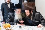 חגיגת הכנסת ספר תורה  להיכל ישיבת עסק התורה  ע"י הרבני הנגיד הרה"ח רבי יואל פליישמאן שליט"א פטרון הישיבה ונדבן הספר  בהשתתפות אדמור"י ורבני העיר שליט"א, מרביצי תורה ותלמידי הישיבה