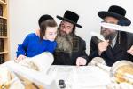 חגיגת הכנסת ספר תורה  להיכל ישיבת עסק התורה  ע"י הרבני הנגיד הרה"ח רבי יואל פליישמאן שליט"א פטרון הישיבה ונדבן הספר  בהשתתפות אדמור"י ורבני העיר שליט"א, מרביצי תורה ותלמידי הישיבה