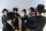 חגיגת הכנסת ספר תורה  להיכל ישיבת עסק התורה  ע"י הרבני הנגיד הרה"ח רבי יואל פליישמאן שליט"א פטרון הישיבה ונדבן הספר  בהשתתפות אדמור"י ורבני העיר שליט"א, מרביצי תורה ותלמידי הישיבה