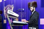 חגיגת הכנסת ספר תורה  להיכל ישיבת עסק התורה  ע"י הרבני הנגיד הרה"ח רבי יואל פליישמאן שליט"א פטרון הישיבה ונדבן הספר  בהשתתפות אדמור"י ורבני העיר שליט"א, מרביצי תורה ותלמידי הישיבה