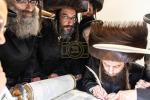 חגיגת הכנסת ספר תורה  להיכל ישיבת עסק התורה  ע"י הרבני הנגיד הרה"ח רבי יואל פליישמאן שליט"א פטרון הישיבה ונדבן הספר  בהשתתפות אדמור"י ורבני העיר שליט"א, מרביצי תורה ותלמידי הישיבה