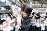 חגיגת הכנסת ספר תורה  להיכל ישיבת עסק התורה  ע"י הרבני הנגיד הרה"ח רבי יואל פליישמאן שליט"א פטרון הישיבה ונדבן הספר  בהשתתפות אדמור"י ורבני העיר שליט"א, מרביצי תורה ותלמידי הישיבה