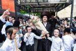 חגיגת הכנסת ספר תורה  להיכל ישיבת עסק התורה  ע"י הרבני הנגיד הרה"ח רבי יואל פליישמאן שליט"א פטרון הישיבה ונדבן הספר  בהשתתפות אדמור"י ורבני העיר שליט"א, מרביצי תורה ותלמידי הישיבה