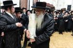 חגיגת הכנסת ספר תורה  להיכל ישיבת עסק התורה  ע"י הרבני הנגיד הרה"ח רבי יואל פליישמאן שליט"א פטרון הישיבה ונדבן הספר  בהשתתפות אדמור"י ורבני העיר שליט"א, מרביצי תורה ותלמידי הישיבה