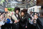 חגיגת הכנסת ספר תורה  להיכל ישיבת עסק התורה  ע"י הרבני הנגיד הרה"ח רבי יואל פליישמאן שליט"א פטרון הישיבה ונדבן הספר  בהשתתפות אדמור"י ורבני העיר שליט"א, מרביצי תורה ותלמידי הישיבה