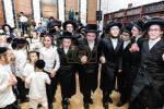 חגיגת הכנסת ספר תורה  להיכל ישיבת עסק התורה  ע"י הרבני הנגיד הרה"ח רבי יואל פליישמאן שליט"א פטרון הישיבה ונדבן הספר  בהשתתפות אדמור"י ורבני העיר שליט"א, מרביצי תורה ותלמידי הישיבה