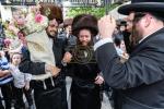 חגיגת הכנסת ספר תורה  להיכל ישיבת עסק התורה  ע"י הרבני הנגיד הרה"ח רבי יואל פליישמאן שליט"א פטרון הישיבה ונדבן הספר  בהשתתפות אדמור"י ורבני העיר שליט"א, מרביצי תורה ותלמידי הישיבה