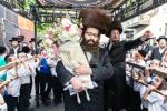 חגיגת הכנסת ספר תורה  להיכל ישיבת עסק התורה  ע"י הרבני הנגיד הרה"ח רבי יואל פליישמאן שליט"א פטרון הישיבה ונדבן הספר  בהשתתפות אדמור"י ורבני העיר שליט"א, מרביצי תורה ותלמידי הישיבה