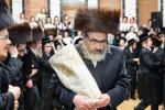 חגיגת הכנסת ספר תורה  להיכל ישיבת עסק התורה  ע"י הרבני הנגיד הרה"ח רבי יואל פליישמאן שליט"א פטרון הישיבה ונדבן הספר  בהשתתפות אדמור"י ורבני העיר שליט"א, מרביצי תורה ותלמידי הישיבה