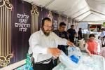 חגיגת הכנסת ספר תורה  להיכל ישיבת עסק התורה  ע"י הרבני הנגיד הרה"ח רבי יואל פליישמאן שליט"א פטרון הישיבה ונדבן הספר  בהשתתפות אדמור"י ורבני העיר שליט"א, מרביצי תורה ותלמידי הישיבה