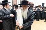 חגיגת הכנסת ספר תורה  להיכל ישיבת עסק התורה  ע"י הרבני הנגיד הרה"ח רבי יואל פליישמאן שליט"א פטרון הישיבה ונדבן הספר  בהשתתפות אדמור"י ורבני העיר שליט"א, מרביצי תורה ותלמידי הישיבה