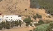 צענדליגע ארעסטירט בשעת אימיגראנטן פרובירן נאכאמאל אריבערצוקראסן דעם טויטליכן סעוטא גרעניץ.