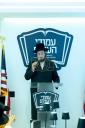 קאנגרעסמאן מייק לאולער טרעט אויף ביי פראכטפולן באנקעט פאר נגידים פונעם סקווירא "עמודי העולם" פראיעקט.