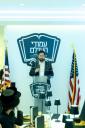 קאנגרעסמאן מייק לאולער טרעט אויף ביי פראכטפולן באנקעט פאר נגידים פונעם סקווירא "עמודי העולם" פראיעקט.