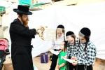 בילדער: כפרות שלאגן אין בני ברק ערב יום כיפור