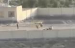 Main image for ארויסגערינענע ווידיאו צייגט א מיליציע זיך טרענירן אינעווייניג אין אן איראנער שולע קעמפוס
