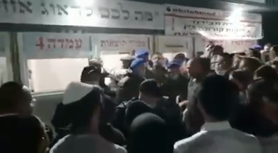 טויזענטער ברסלבער חסידים ביים ווארטן אויף זייער וויירוס טעסט איידערן צוריק פארן קיין ארץ ישראל 