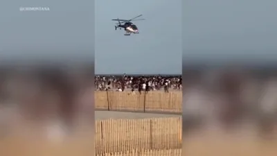 א פאליצייאישע העליקאפטער פליט 50 פוס העכער א לאקאלע ביטש