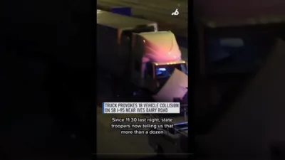 א מאסיווע קאר צוזאמענשטויס אין מיאמי לאזט איבער 29 פארוואונדעטע.