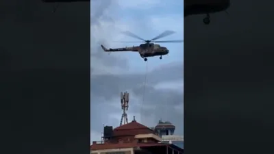 נעפאל מיניסטארן אנטלויפן פון פראטעסטן דורכן זיך הייבן מיט העליקאפטערס