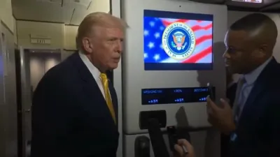 טראמפ בארואיגט ריפארטערס אז נאר ארימע וועלן באקומען די 2000 דאלער טשעק