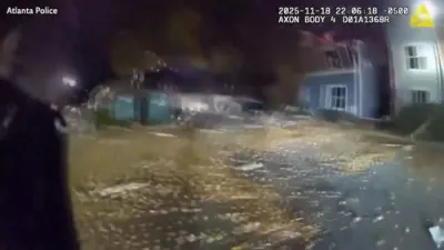 פאליציי ראטעוועט א מאן נאך א געביידע אויפרייס אין דזשארדזשע 