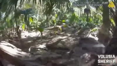 א פלארידע מאן האט זיך באהאלטן פון פאליציי אין זומפ