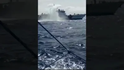 פיליפינער פיש כאפער פארוואונדעט נאך א אטאקע פון א כינעזישער וואסער קאנאן.