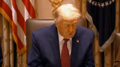 טראמפ זאגט אז די אמעריקאנע און טשיינע האנדל גייט זיך נאך אביסל באנייען