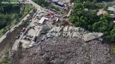 טויטלעכער צוזאמענפאל פון א מיסט-פלאץ באגראבט צענדליגער ארבעטער אין די פיליפינען.