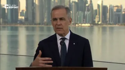 קאנאדע פריים מיניסטער קארני רעדט איבער עקאנאמיע 