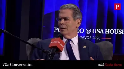 טרעזשורי סעקרעטאר סקאט בעסענט בארימט זיך מיט ניוסאמס קאמענטאר איבער קני שוץ אין דאוואס.