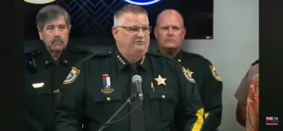 פלארידע שעריף רעאגירט צום מיניאפעליס שיסעריי 