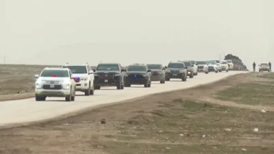 סירישע רעגירונג קרעפטן גייען אריין אין קורדישע שטאט אונטער א אמעריקאנער-געשטיצטע אפמאך.