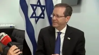 פרעזידענט הערצאג זאגט אז פראטעסטירער זאלן אטאקירן די איראנע רעגירונג 