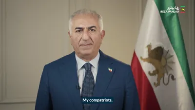 רזא פאהלאווי דרינגט איראנער צו פראטעסטירן בשעת ​​פייער פעסטיוואל.