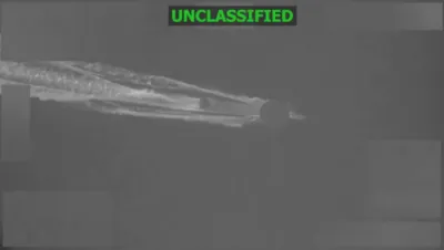 אמעריקאנע כוחות זינקען א טעראר פארבונדענע שמוגלער שיפל