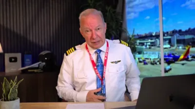 א צוזאמענברוך פון די עיר קאנאדע עקספרעס קאטאסטראפע וואס שאקלט לאגווארדיא לופטפעלד.