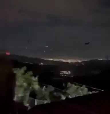 זעט: אמעריקאנער "נייט סטאקערס" פירן דורך א פונקטליכע רעיד אין ווענעזועלע.