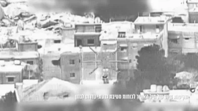 קאארדענירטע צה"ל אטאקע אויף א חיזבאללה געביידע פון אויבן און פון די גראונד