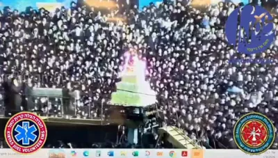 קרית יואל - א בליק הונטער די קוליסן ביים גרויסארטיגע הדלקה פון האדמו"ר מסאטמאר, אין די פאראייניגטע קאמענד צענטער פון חברה הצלה און מצילי אש.