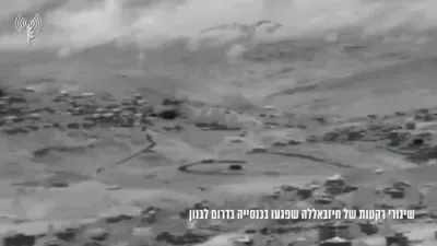 נעכטן, חיזבאללה'ס טויטליכע דורכפאל: ראקעטן האבן גערעגנט אויף די קריסטליכע מארדזשאיון, און געשעדיגט די היסטארישע 'סעינט דזשארדזש' קירכע.