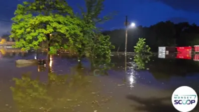 כאאס אין ספרינג וואלי נאך שווערע פארפלייצונגען &ndash; מעמאריעל פארק פארקינג לאט אונטערן וואסער נאך א מאסיוון שטורעם.
