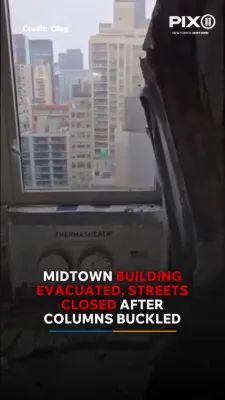 חלק פון א מאנהעטן געביידע האט אנגעהויבן צופאלן! - די גאס עוועקואירט.