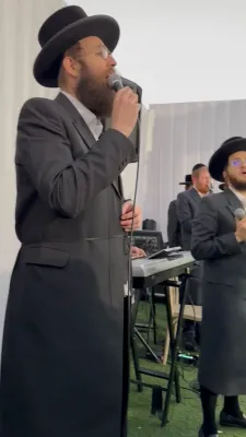 כ"ק אדמו"ר מדושינסקיא שליט"א ווערט געזען שטיין ביי א חופה כאחד האדם