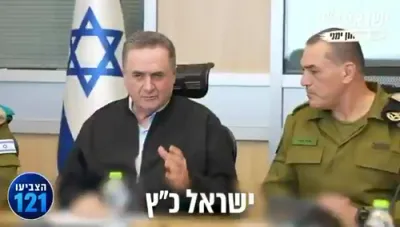 דיפענס מיניסטער כ"ץ גיט ארויס אן עקספלאזיווע קאמפיין אדווערטייזמענט מיט "בום בום בום"