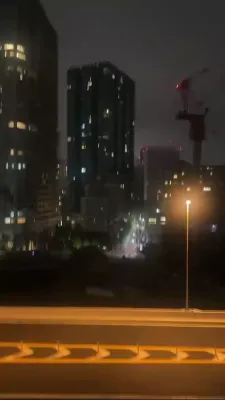 אלערט אינמיטן די נאכט: הילכערס ווארענען איינוואוינער נאך א שטארקע ערדציטערניש אין די טאקיא געגנט